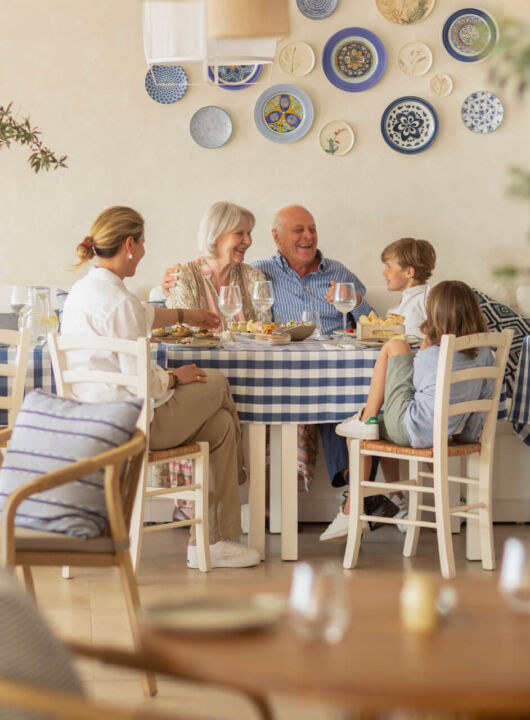 Family eating at Louis Nausicaa Taverna restaurant