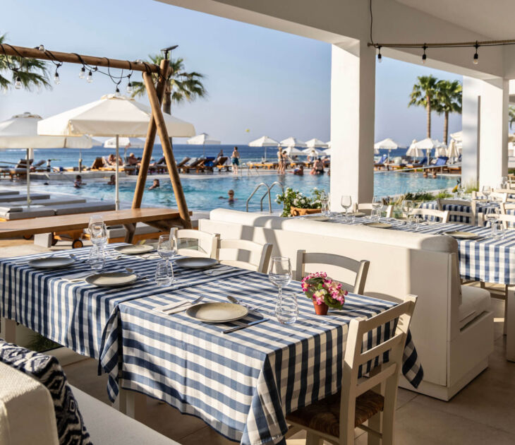 Louis Nausicaa Taverna restaurant pool side tables