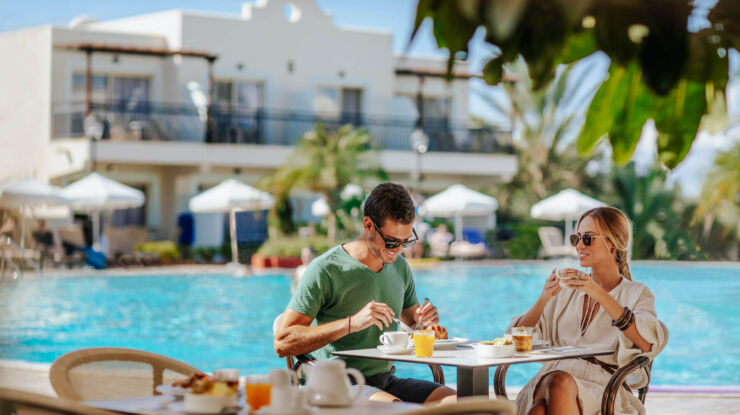 Couple having breakfast at Louis Paphos Breeze