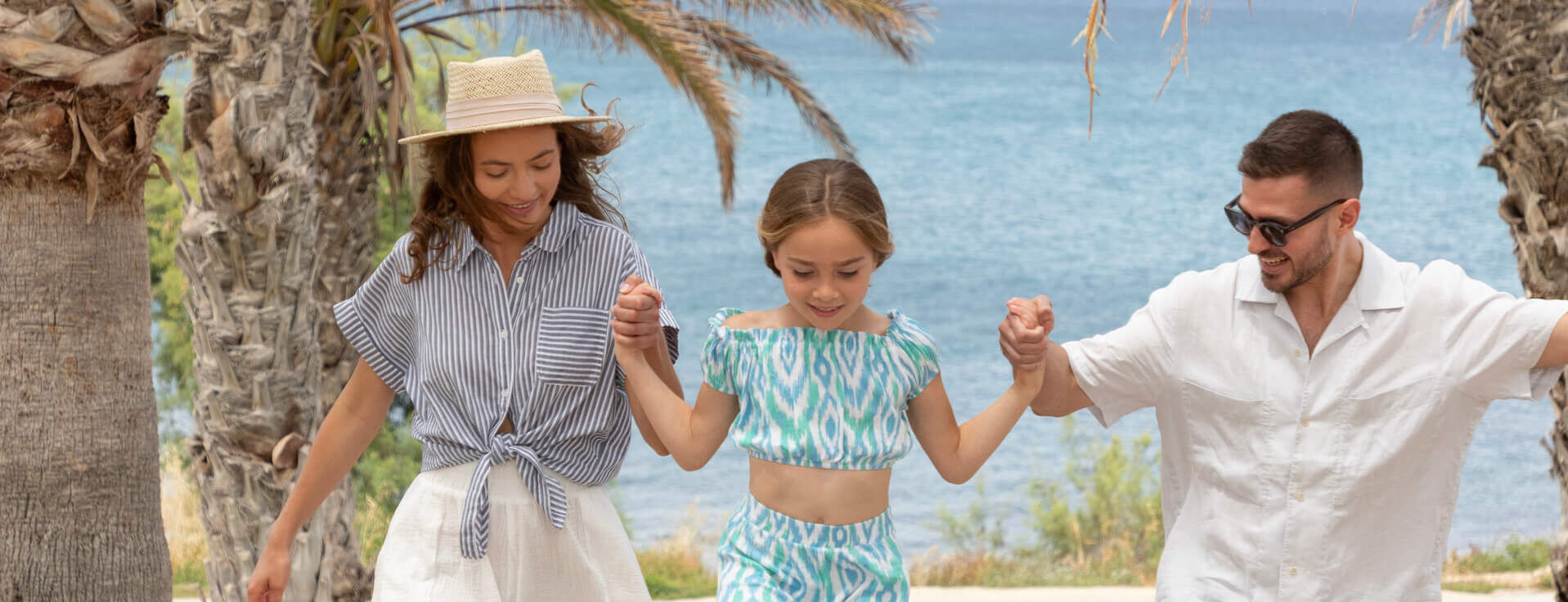 Family walking at Louis Paphos Breeze garden