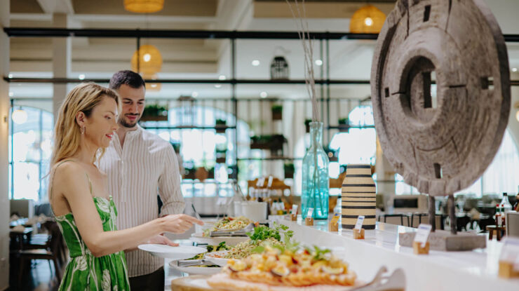 Couple eating at Louis Phaethon buffet