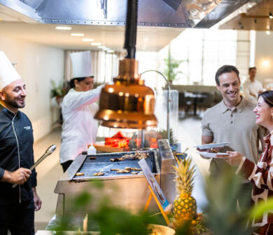 Couple talking with chef at Louis Phaethon