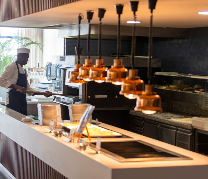 Chef preparing food at Louis Phaethon Esperides Restaurant