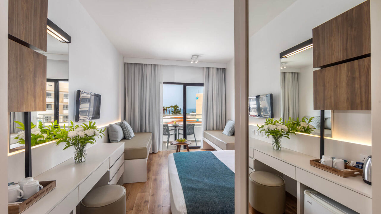 Louis Phaethon family room bedroom with balcony and sea view