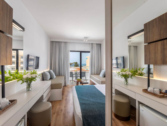 Louis Phaethon family room bedroom with balcony and sea view