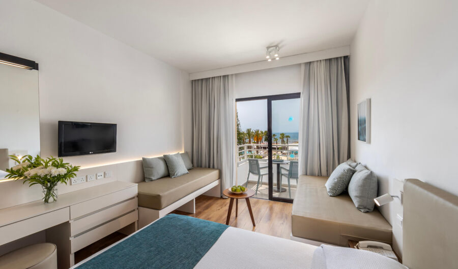 Louis Phaethon family room bedroom with extra couch and sofas