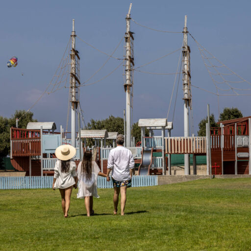 Family walking to children play area at Louis Phaethon hotel
