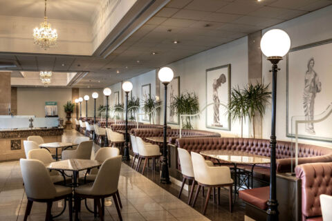 Louis Phaethon restaurant with tables and couches