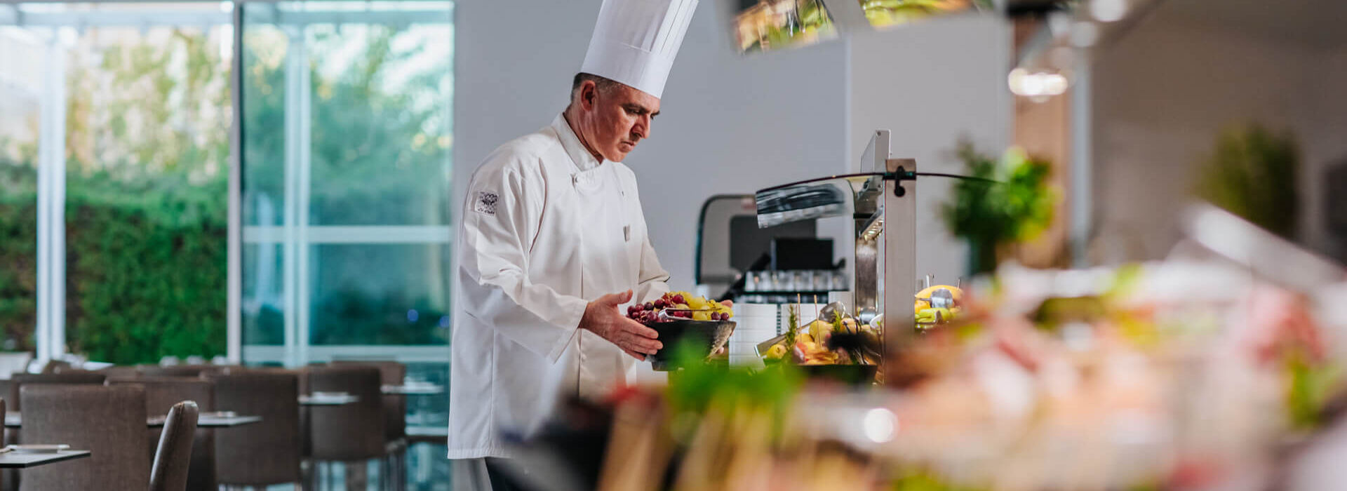 Chef serving buffet at Sofianna Resort restaurant