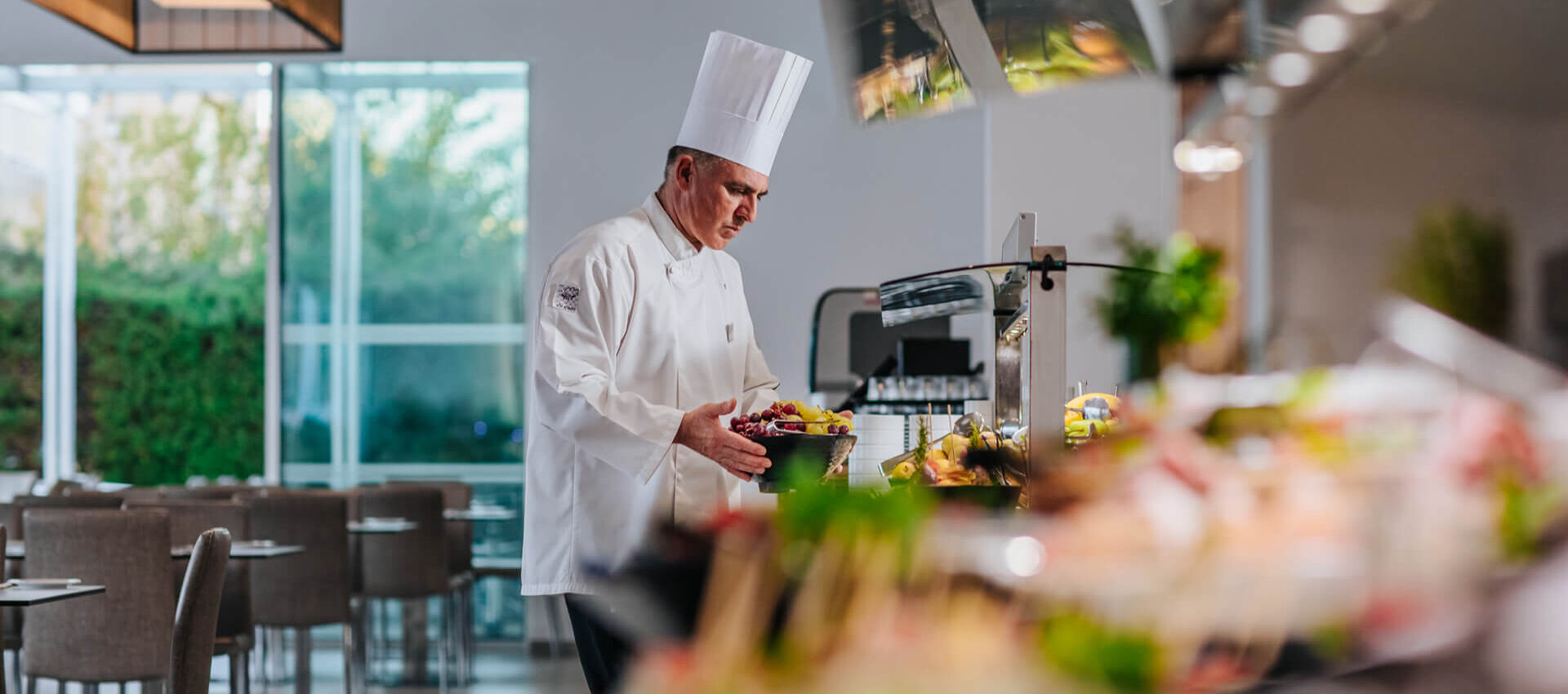 Chef serving buffet at Sofianna Resort restaurant