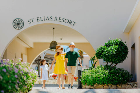 Family walking through entrance of St.Elias