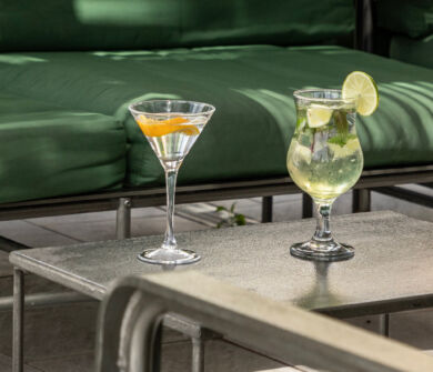 Table with two coktails at St. Elias jacaranda bar