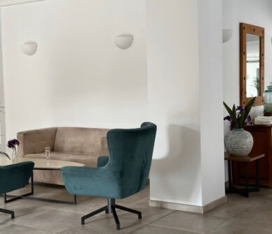 Indoor table sofas and couch at St. Elias jacaranda bar