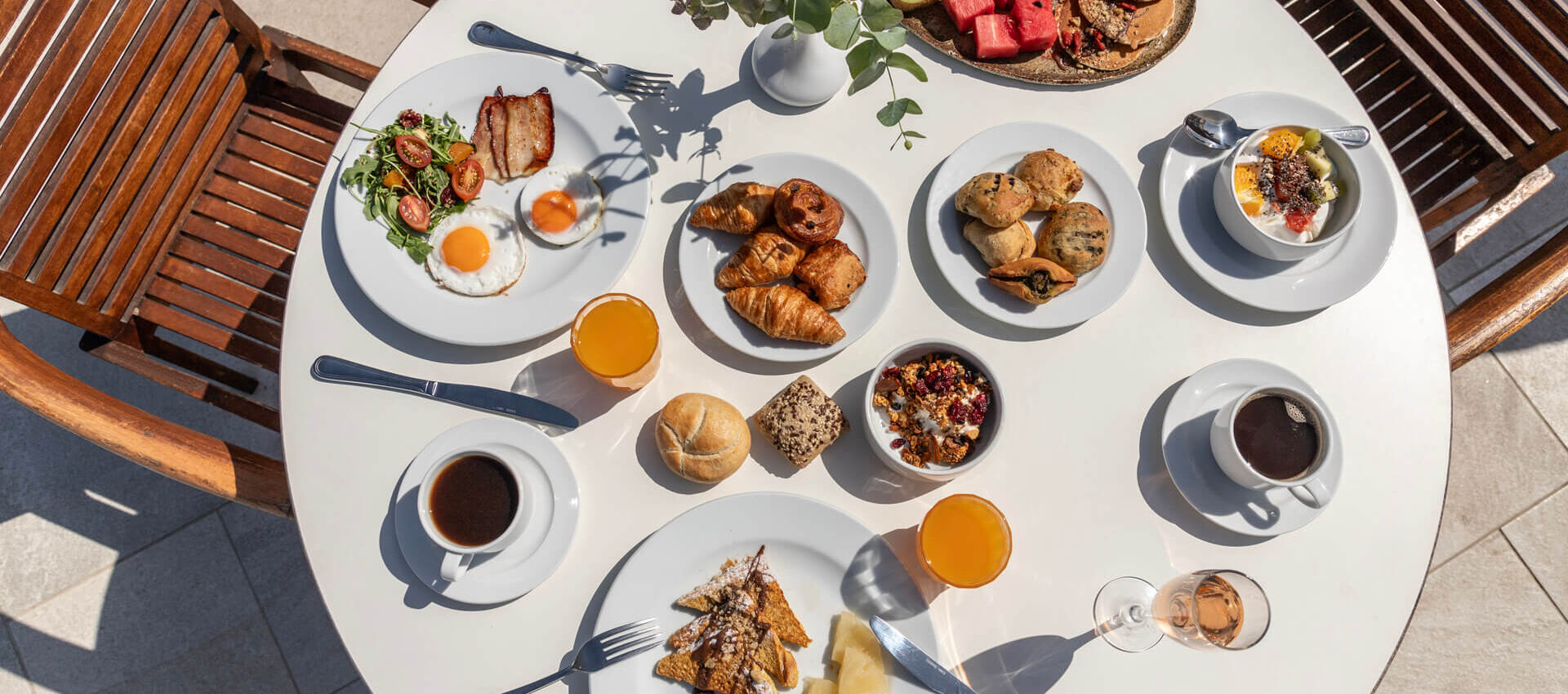 Table full of breakfast dishes at St. Elias Lemon tree restaurant