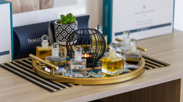 Disk with candle and oils for massage at Louis St. Elias Spa