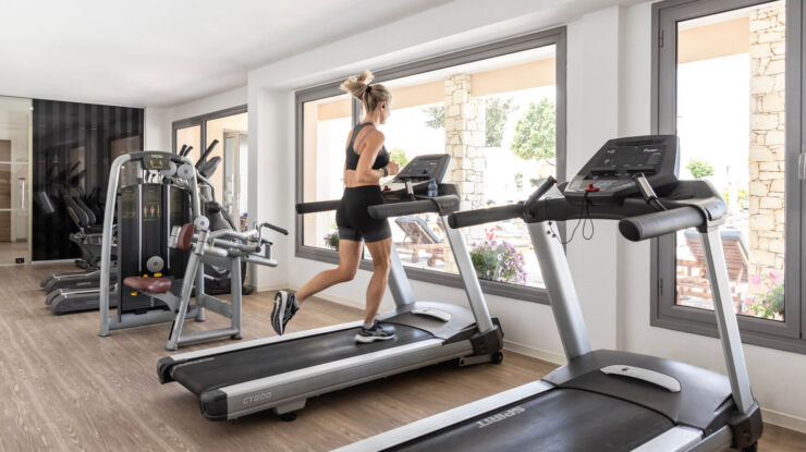Woman working out at Louis St. Elias gym
