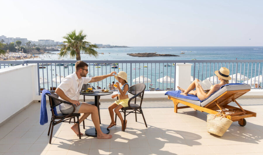 Family relaxing at Nausicaa superior suite balcony