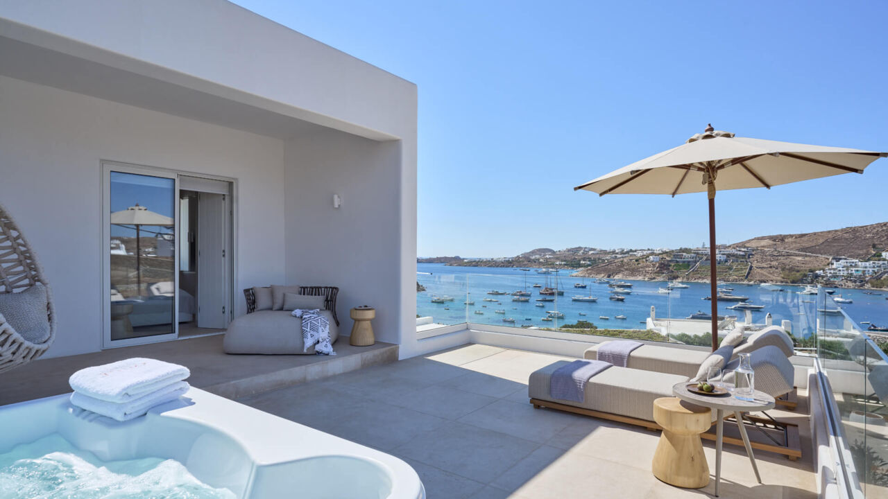 Once In Mykonos balcony with sunbed and jacuzzi