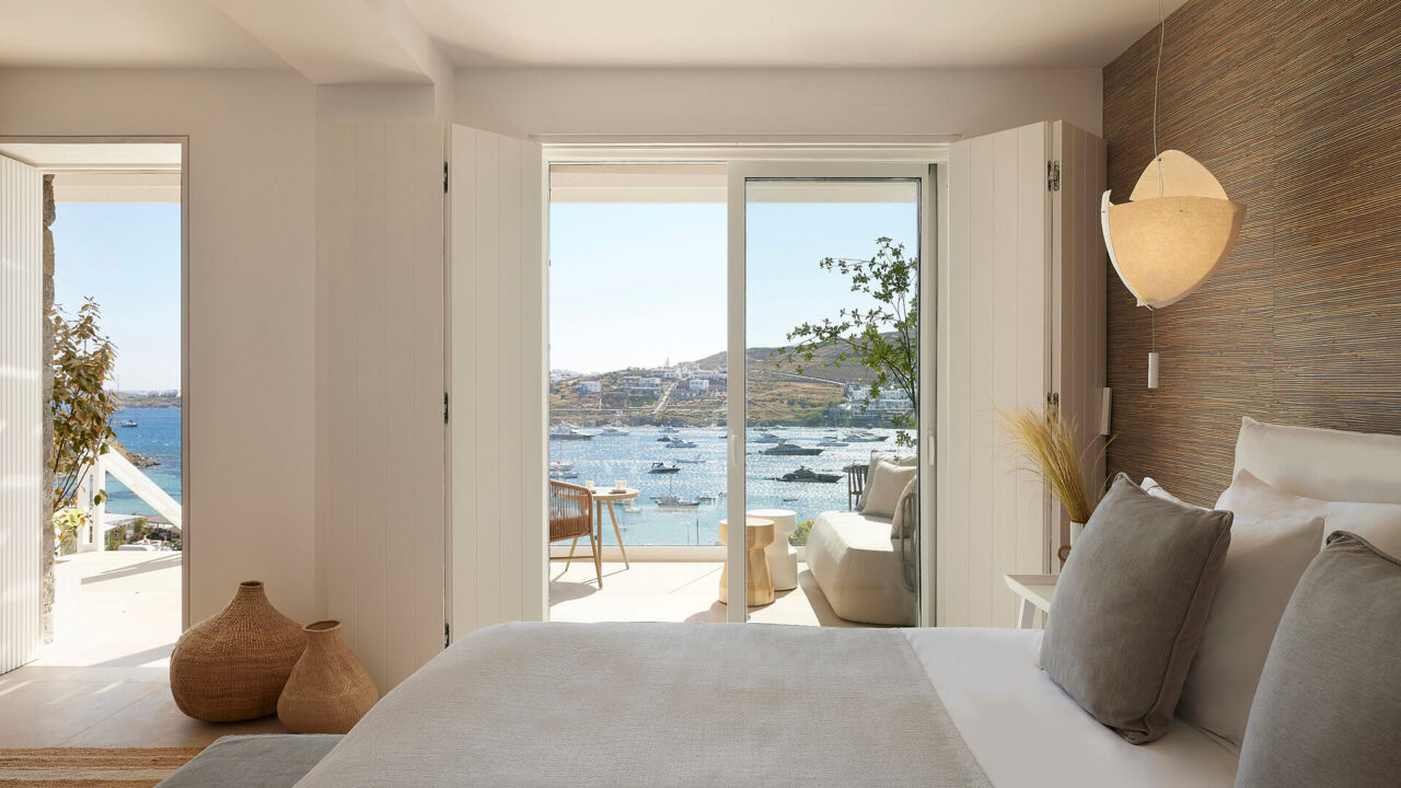 Once In Mykonos room bed and window with sea view