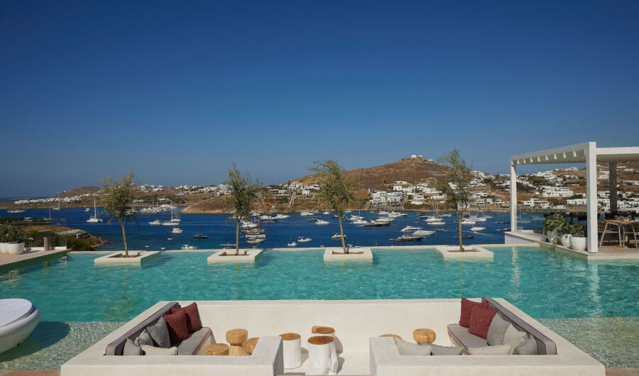 Poolside Couches with sea view and lots of small ships