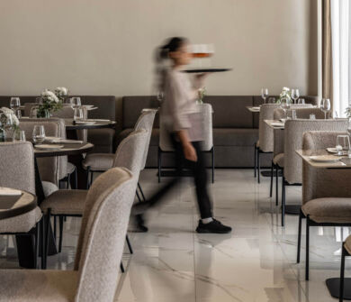Waitress with drinks in Cali Hotel restaurant