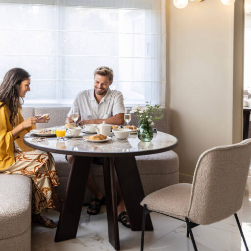 Man and woman having breakfast