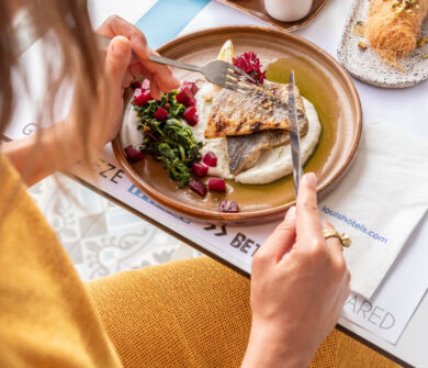 Woman eating at Paphos Meze restaurant