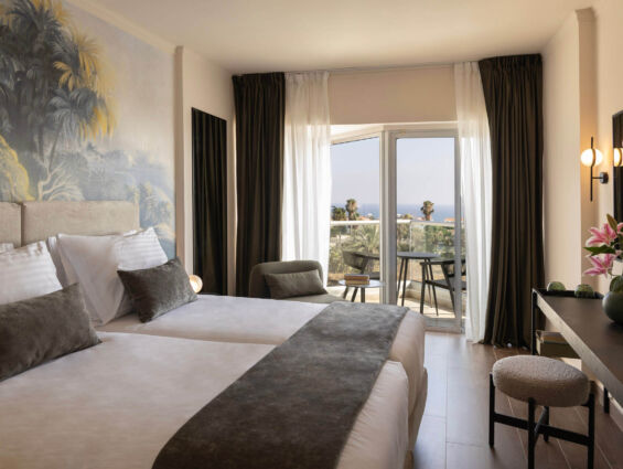 Cali Resort Superior room with Side Sea View bedroom
