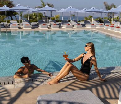 Couple relaxing at Ivi Mare Utopia pool bar