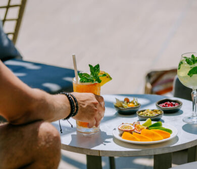 Table with snacks and cocktails at Ivi Mare Utopia pool bar