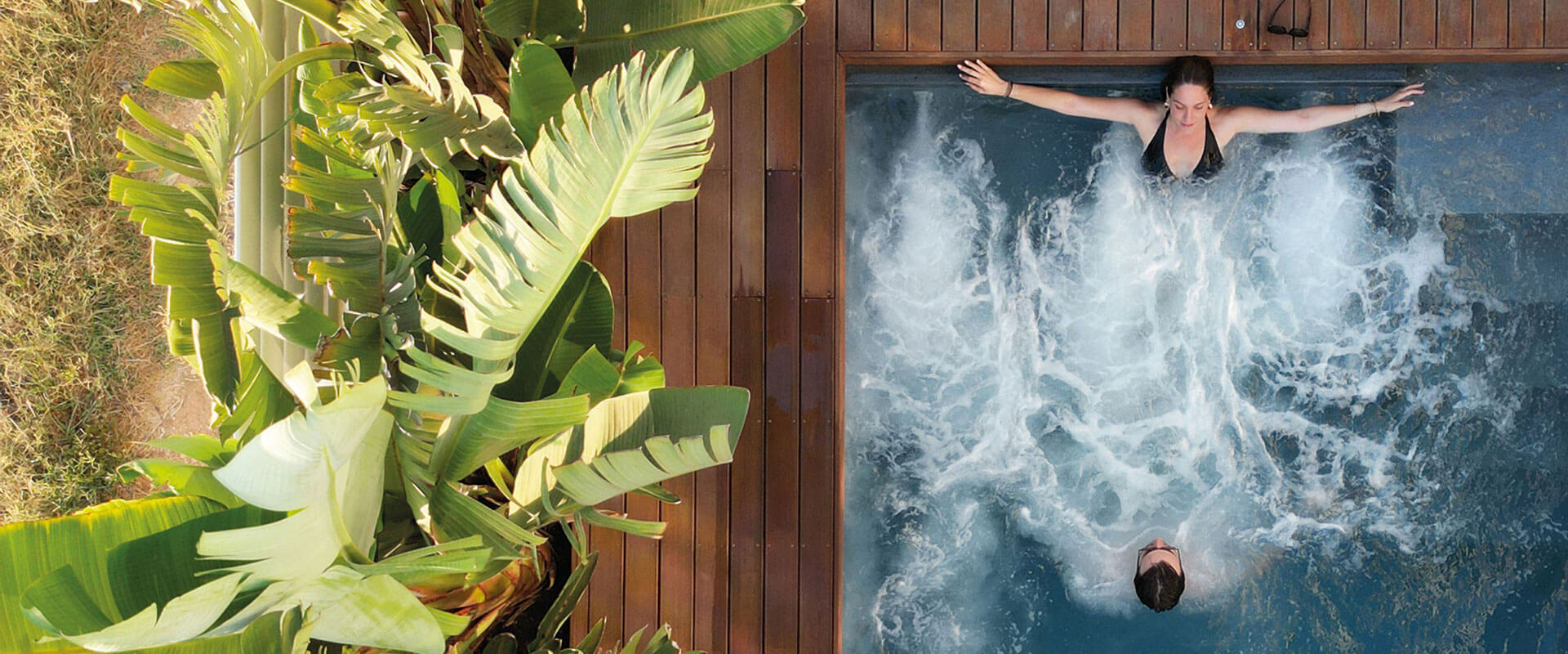 Couple in private villa hot tub