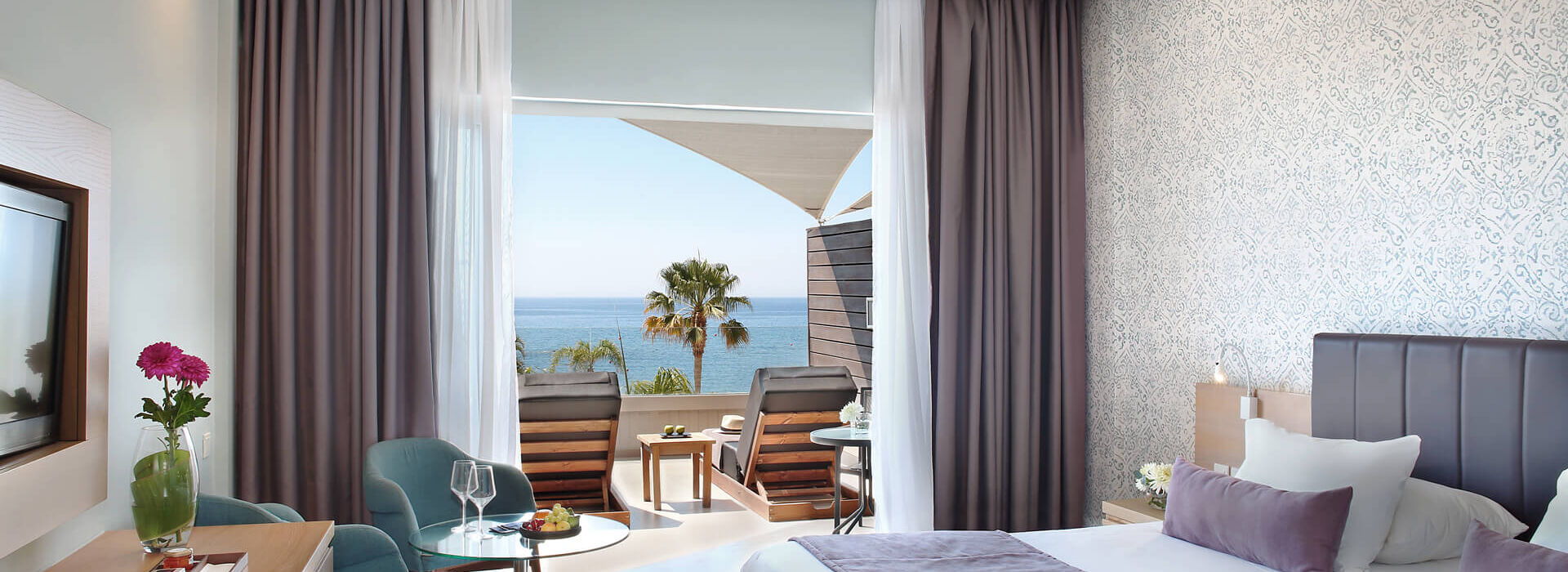 Royal Apollonia Room bedroom and balcony