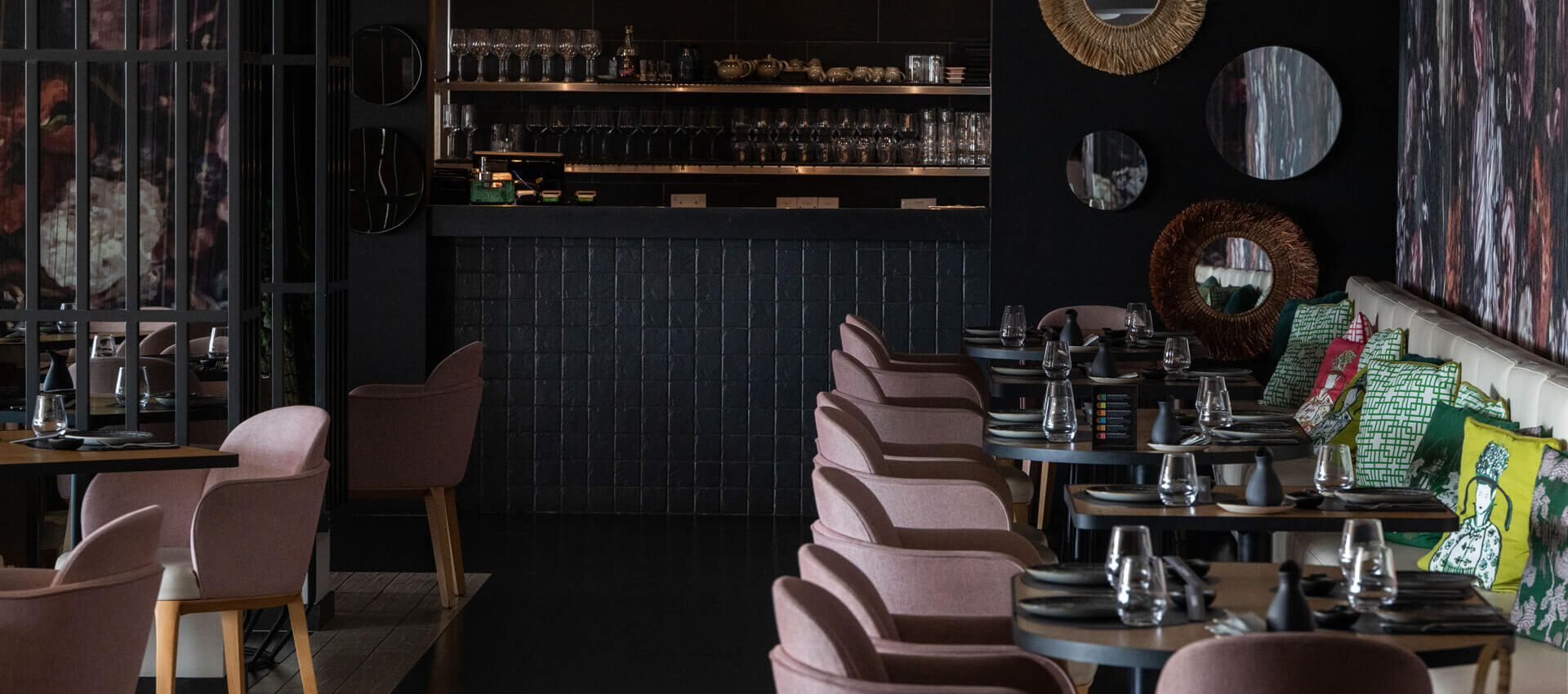 Royal Apollonia Akakiko Restaurant indoor space tables and couch
