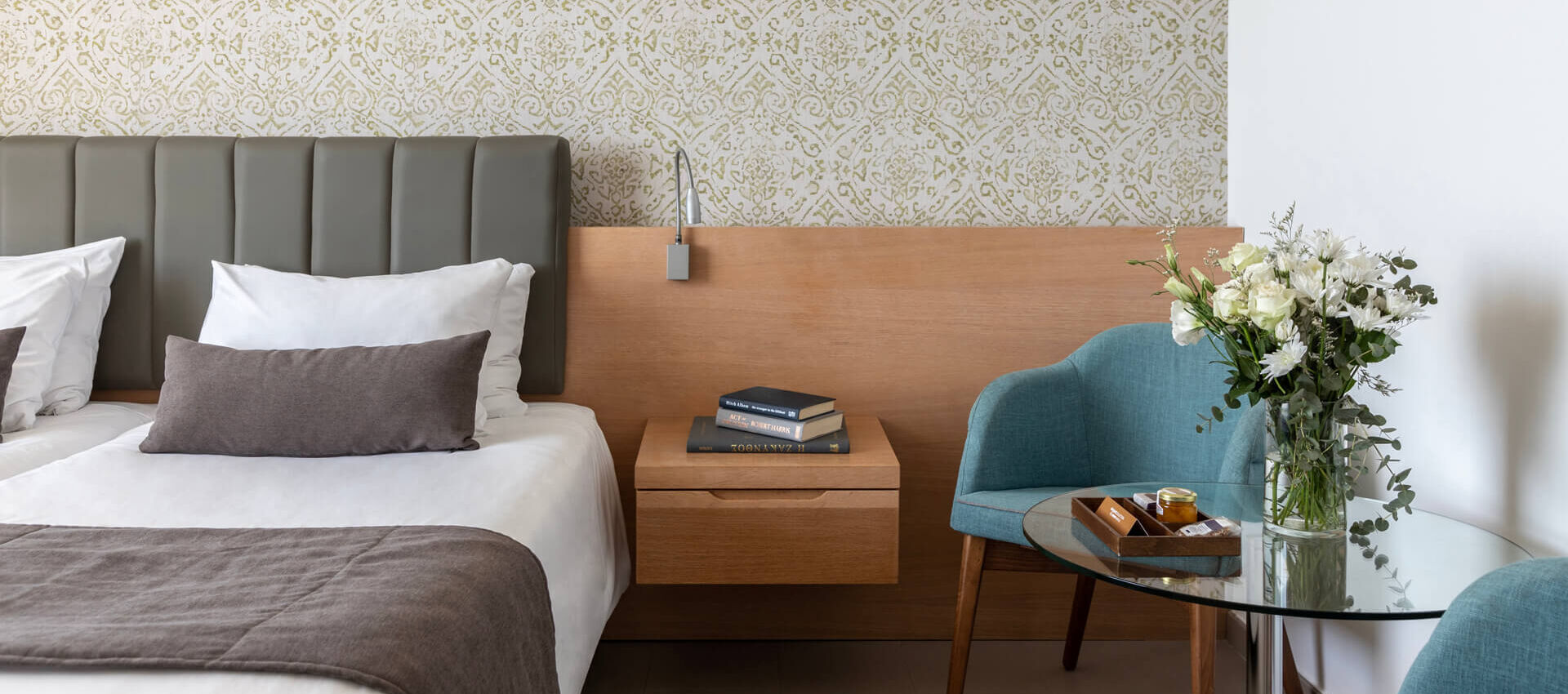 Royal Apollonia Family room bedroom and side table