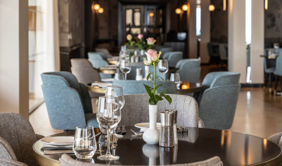 Indoor Tables prepared for dinner at Royal Apollonia