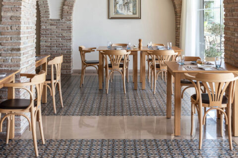 Indoor tables prepared for dinner