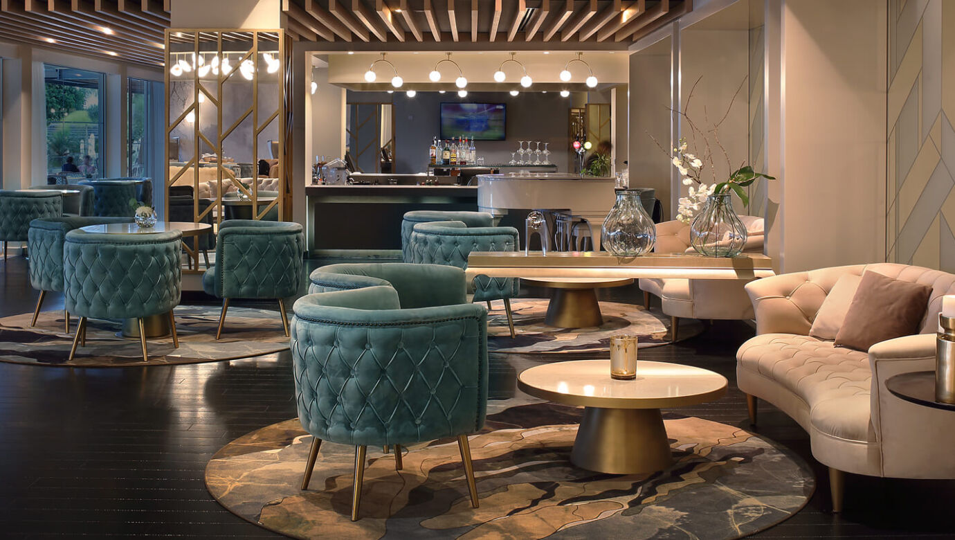 Royal Apollonia Lounge bar indoor space with couch and sofas
