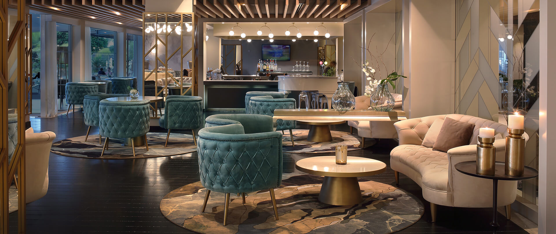Royal Apollonia Lounge bar indoor space with couch and sofas