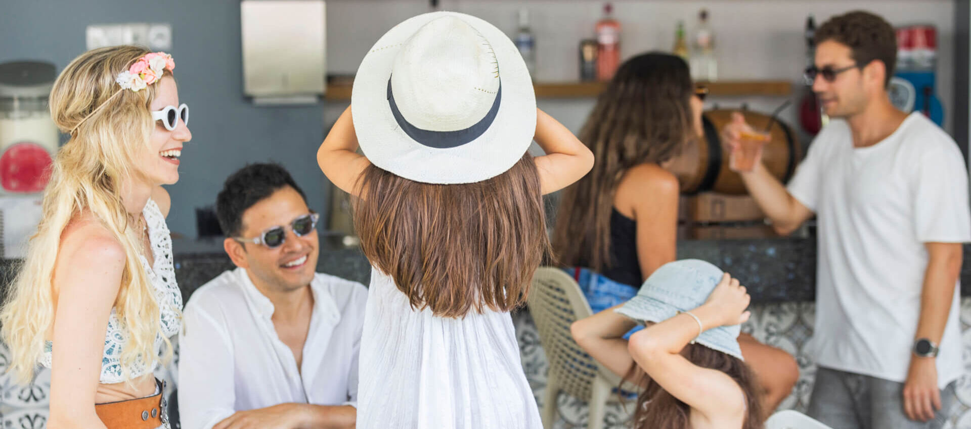 Family laughing at Sofianna Resort Ammos bar