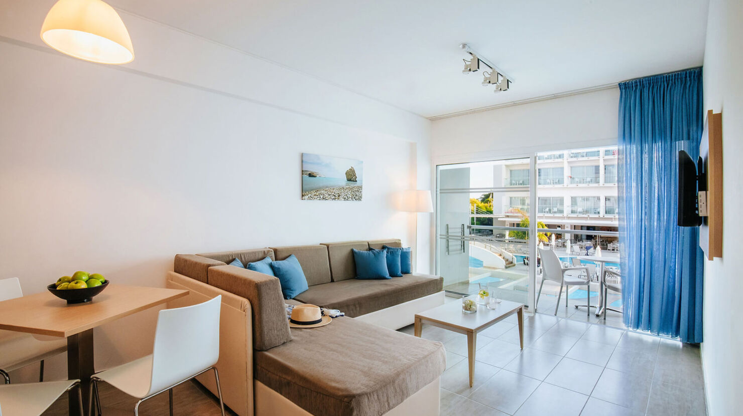 Sofianna Deluxe Pool Room Sitting area and balcony