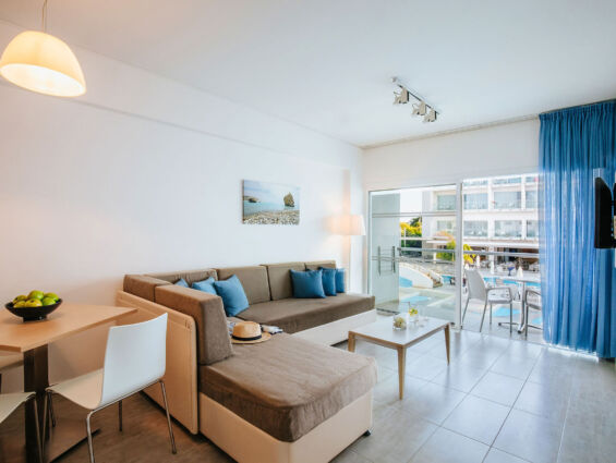 Sofianna Deluxe Pool Room Sitting area and balcony