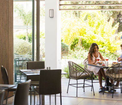 Couple eating at Sofianna Resort Mesogios A la Carte Restaurant