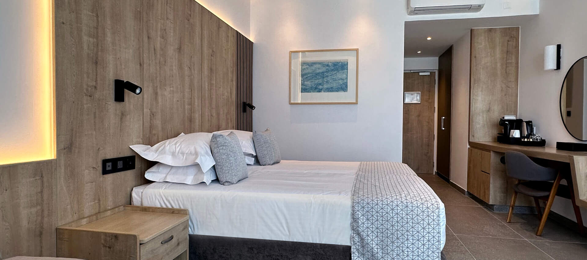 Premium Room Bedroom sitting area and Bed