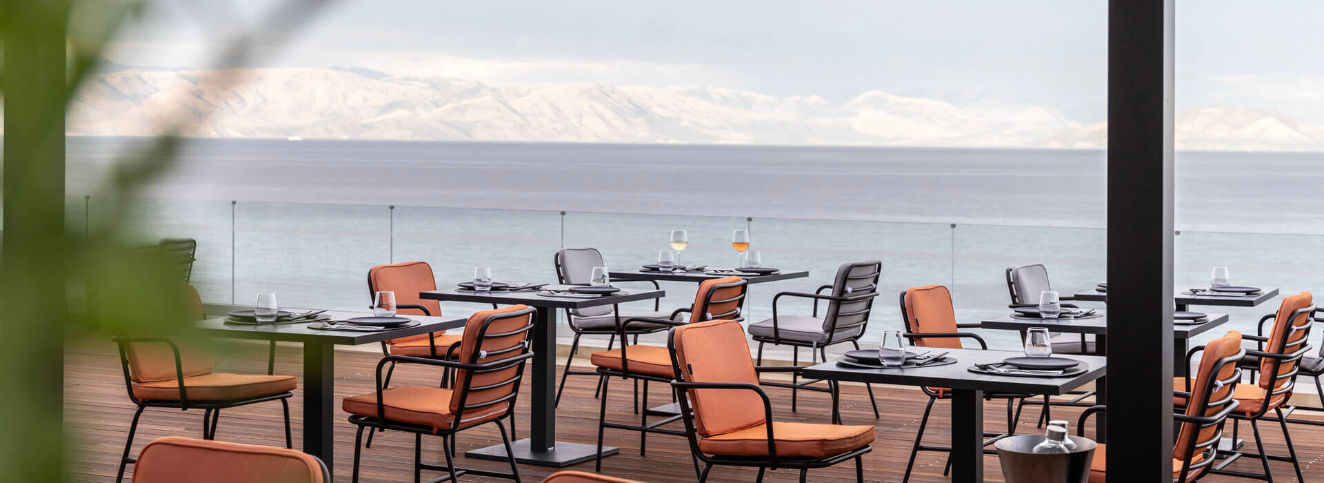 Outdoor Tables prepared for dinner at Valmar Corfu