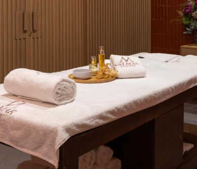 Massage bed prepared with towels and oils at Valmar Corfu Spa