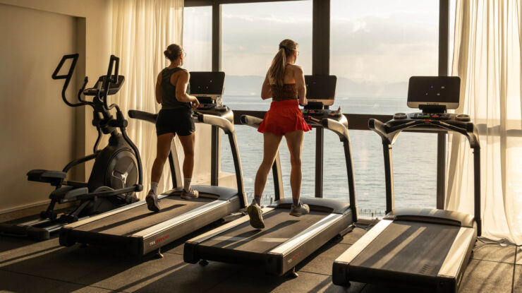 Two women on treadmills at Valmar Corfu gym