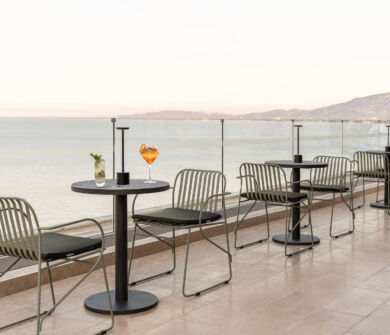 Rooftop tables and chairs with sea view Valmar Corfu tarazza restaurant