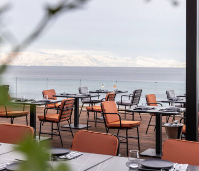 Outdoor space with chairs and tables at Valmar Corfu Viru restaurant