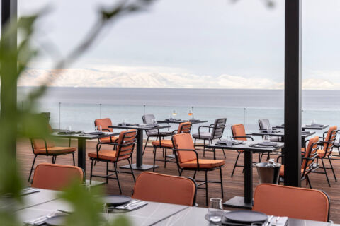 Outdoor space with chairs and tables at Valmar Corfu Viru restaurant