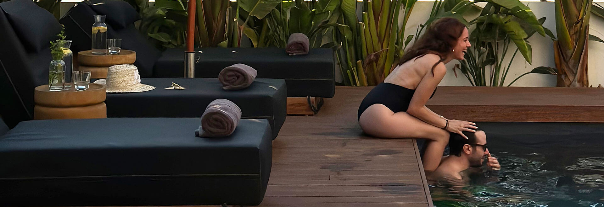 Couple in private villa pool